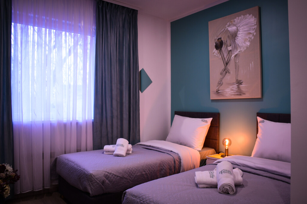 Čisti i udobni jednokrevetni kreveti u apartmanu